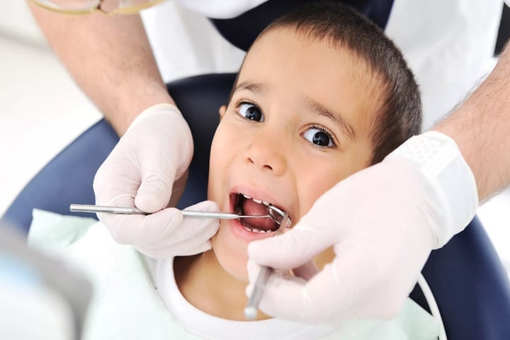 کشیدن دندان کودک با بیهوشی